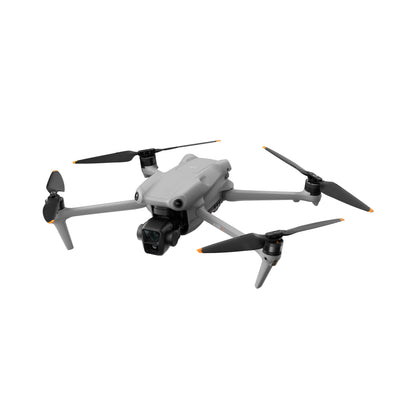 DJI Air 3 drone in mid-flight with extended propellers
