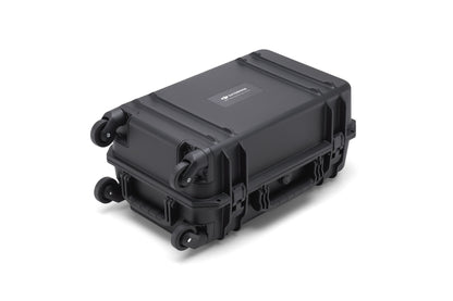 Side view of DJI BS65 battery station with visible charging ports for multiple batteries
