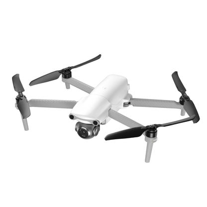 White Autel EVO Lite drone flying, angled side view with extended propellers
