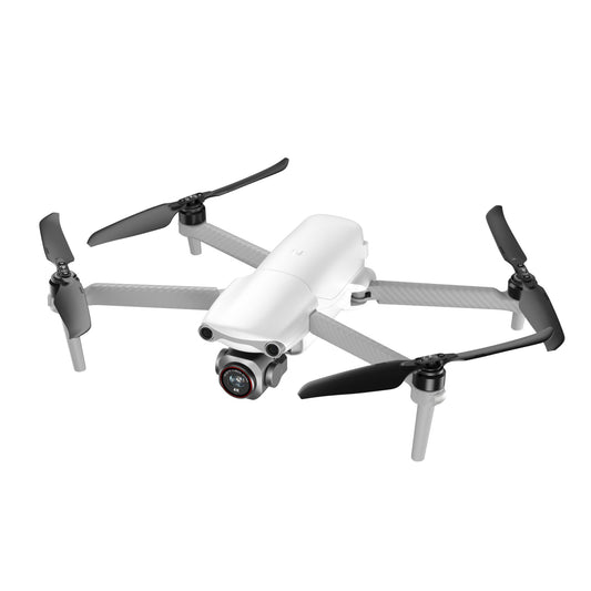 White Autel EVO Lite drone with extended propellers in mid-flight, angled view
