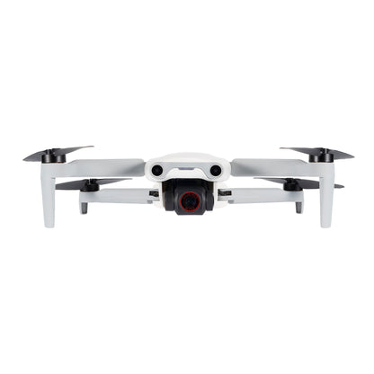 White Autel EVO Nano drone in mid-flight, side view with camera
