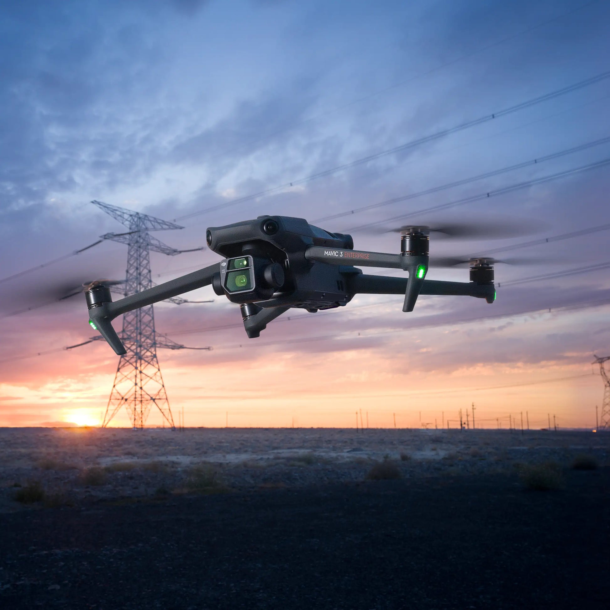 DJI Mavic 3E drone in flight over powerlines for high-altitude surveying