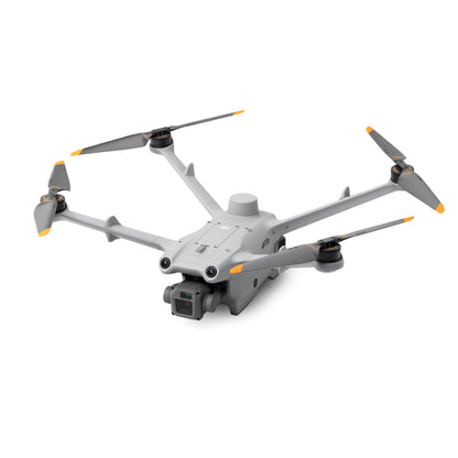 Angled front view of DJI Matrice 3D drone flying with landing gear and camera visible