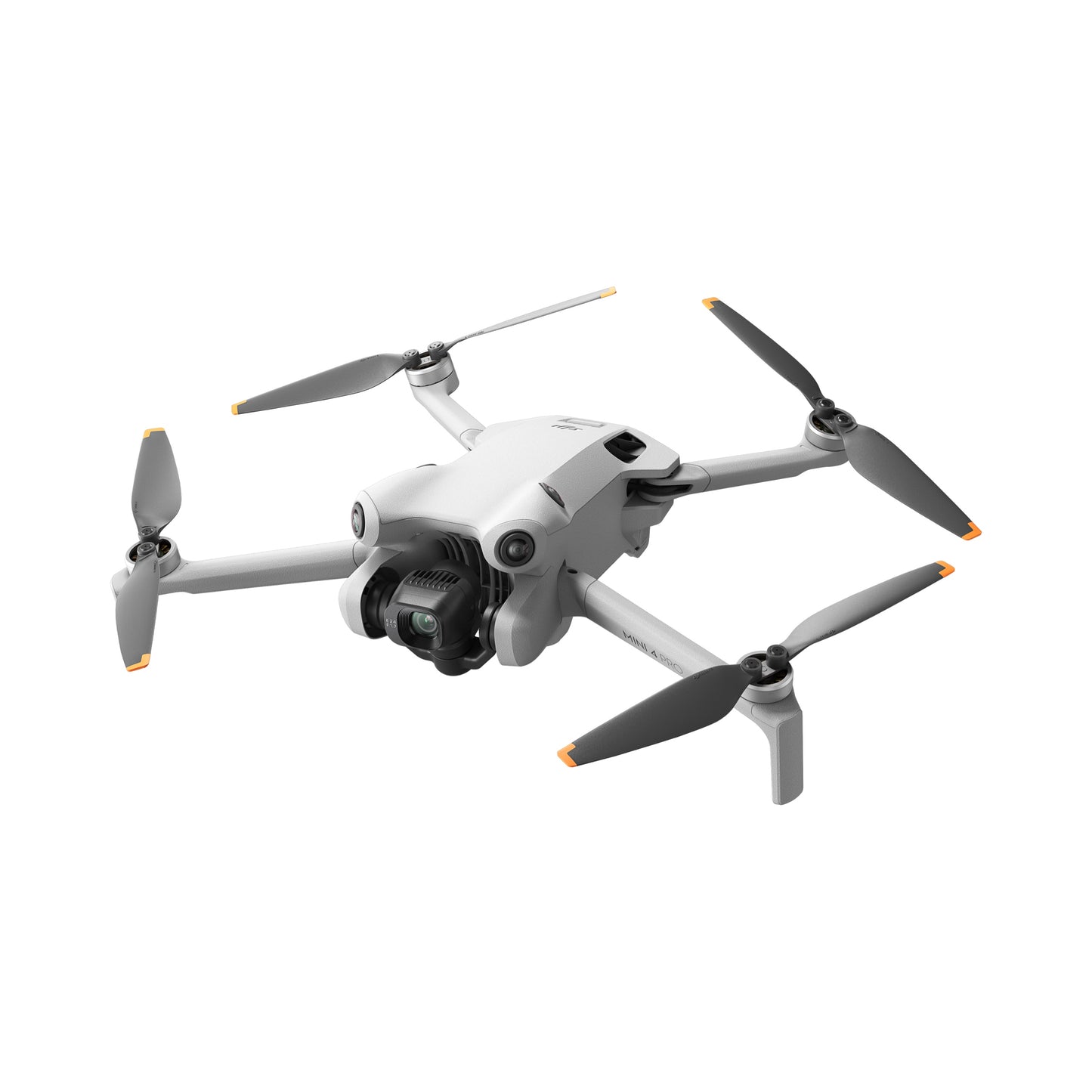 DJI Mini 4 Pro drone in mid-flight, angled view with extended propellers
